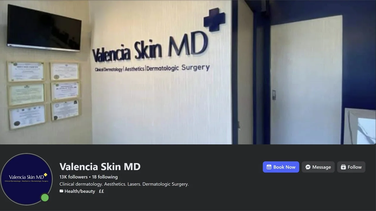 Inside Valencia Skin MD, showing the clinic signage and framed certificates