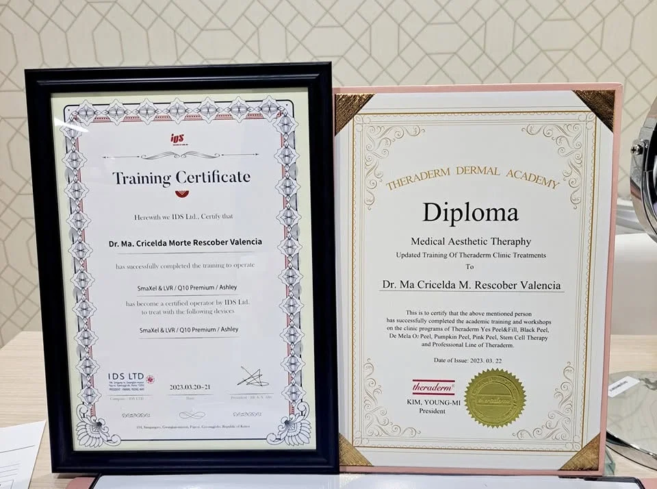 Framed dermatology training certificates hung on the wall inside the Valencia Skin MD clinic in Quezon City